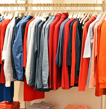 Canva - Colorful Clothes Hanging on a Ra